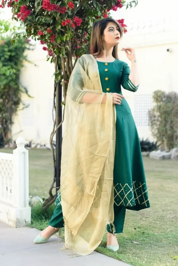 green suit golden dupatta